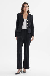 Blazer negro de mujer con botones dorados y bolsillos delanteros estilo formal elegante sin estampa lisa