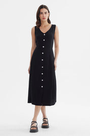 Vestido negro sin mangas con botones blancos al frente estilo minimalista diseño ajustable liso