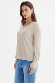Sweater ajustado beige de mujer con textura acanalada sin estampa lisa elegante para cualquier ocasión