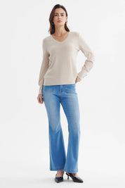 Sweater ajustado beige de mujer con textura acanalada sin estampa lisa elegante para cualquier ocasión