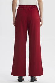 Pantalón mujer rojo oscuro con pretina y cordón ajustable sin estampa liso ideal para un look casual y cómodo