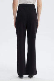 Pantalón negro mujer con aplicación metálica dorada en el cinturón estilo formal sin estampa lisa y elegante