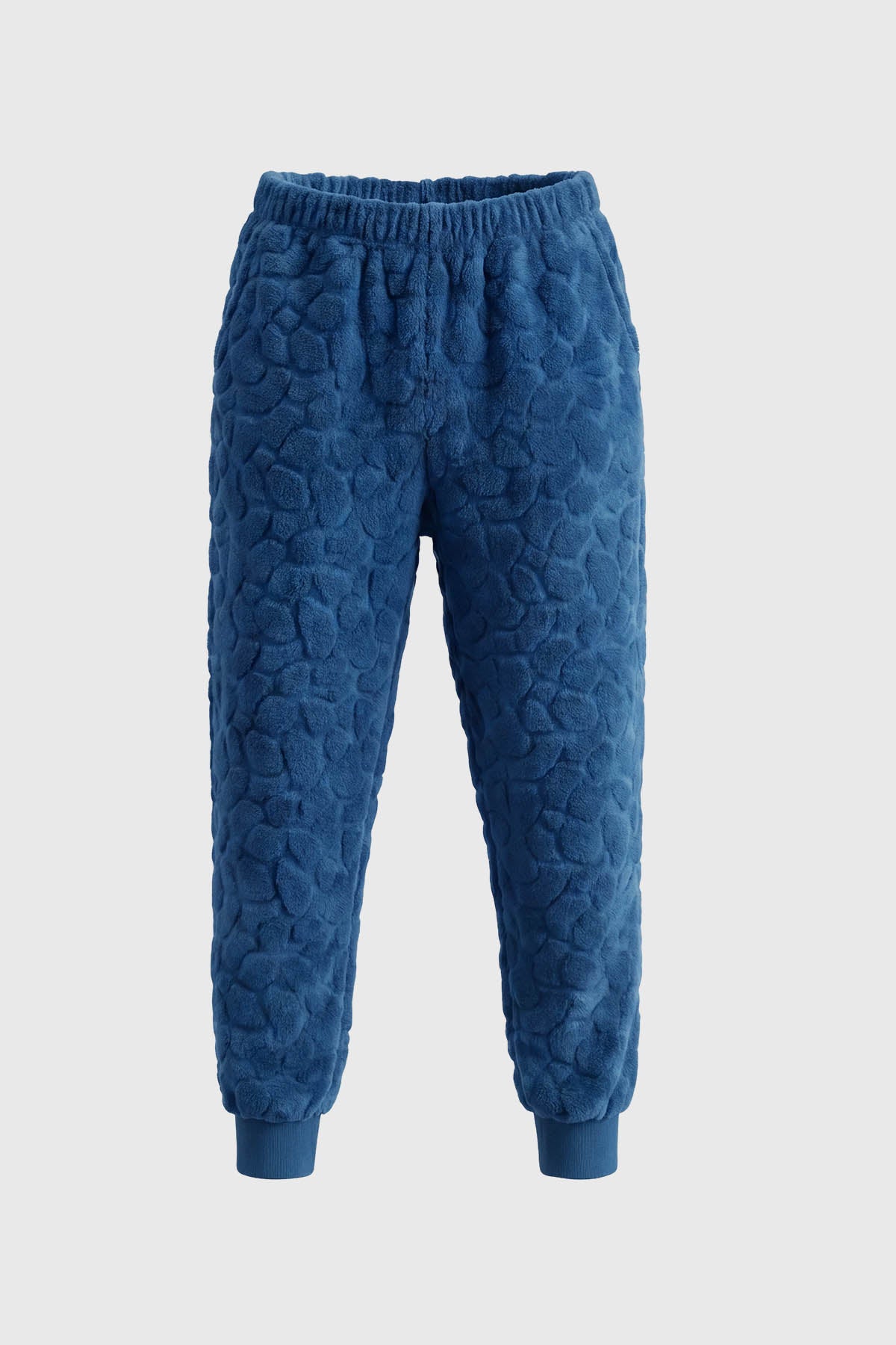 Pijama de niño azul con capucha de dinosaurio y bolsillo celeste diseño escamas en toda la prenda estilo divertido