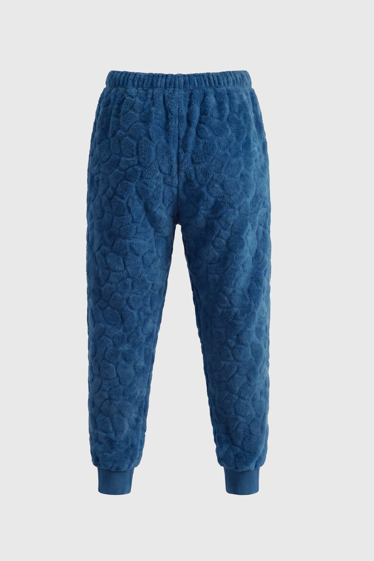 Pijama de niño azul con capucha de dinosaurio y bolsillo celeste diseño escamas en toda la prenda estilo divertido