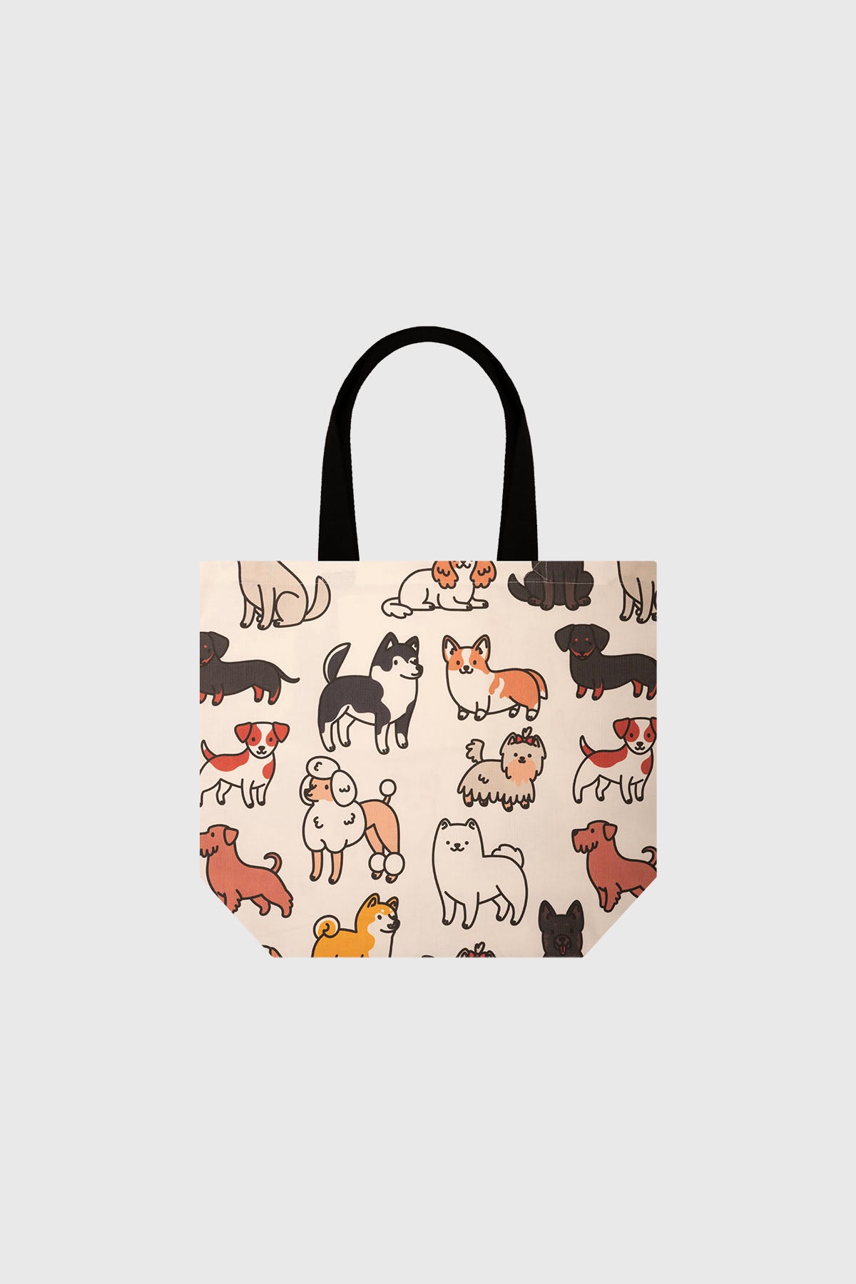 Bolsa grande blanca con estampado de perros en estilo caricatura de colores diversos sobre fondo claro sin texto visible