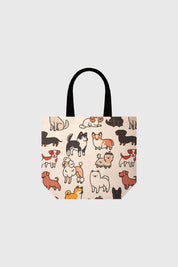 Bolsa grande blanca con estampado de perros en estilo caricatura de colores diversos sobre fondo claro sin texto visible