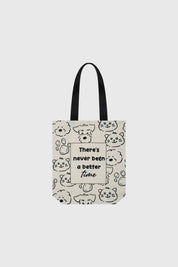 Bolsa pequeña crudo con diseño de caras de perros y gatos en negro texto en el centro que dice There's never been a better time