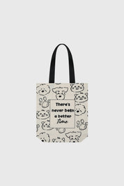 Bolsa pequeña crudo con diseño de caras de perros y gatos en negro texto en el centro que dice There's never been a better time