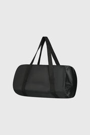 Bolsa plegable negra lisa con asas largas diseño simple funcional y minimalista sin estampa visible
