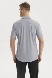 Camisa celeste de hombre con corte slim cuello camisero lisa sin estampado