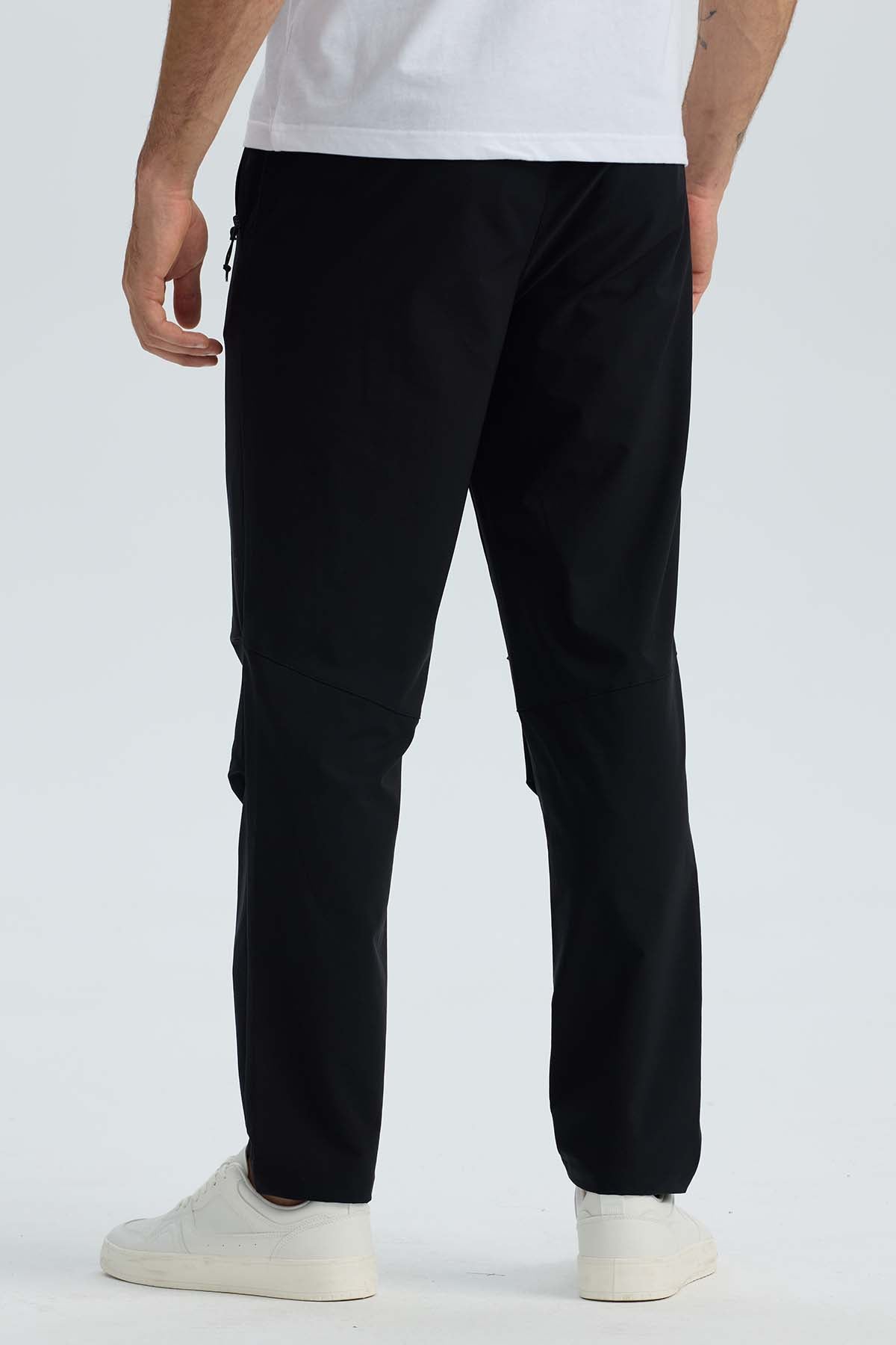 Pantalón buzo hombre calce recto negro