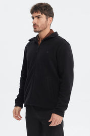 Polar negro para hombre con diseño liso y cierre frontal práctico