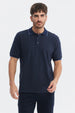 Polera pique azul marino con mini print de puntos blancos estampados por toda la prenda estilo casual