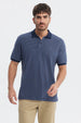Polera pique azul marino con rayas finas y logo pequeño en el pecho prenda lisa y elegante ideal para el día a día