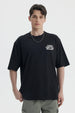 Polera oversize negra para hombre con texto 'Every Single Day Counts' en el pecho estilo casual moderna y cómoda