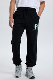 Pantalón Buzo Hombre Print College Negro