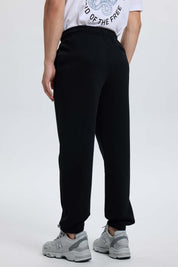 Pantalón Buzo Hombre Print College Negro
