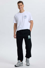 Pantalón Buzo Hombre Print College Negro