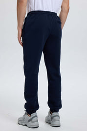 Pantalón buzo hombre jogger azul oscuro
