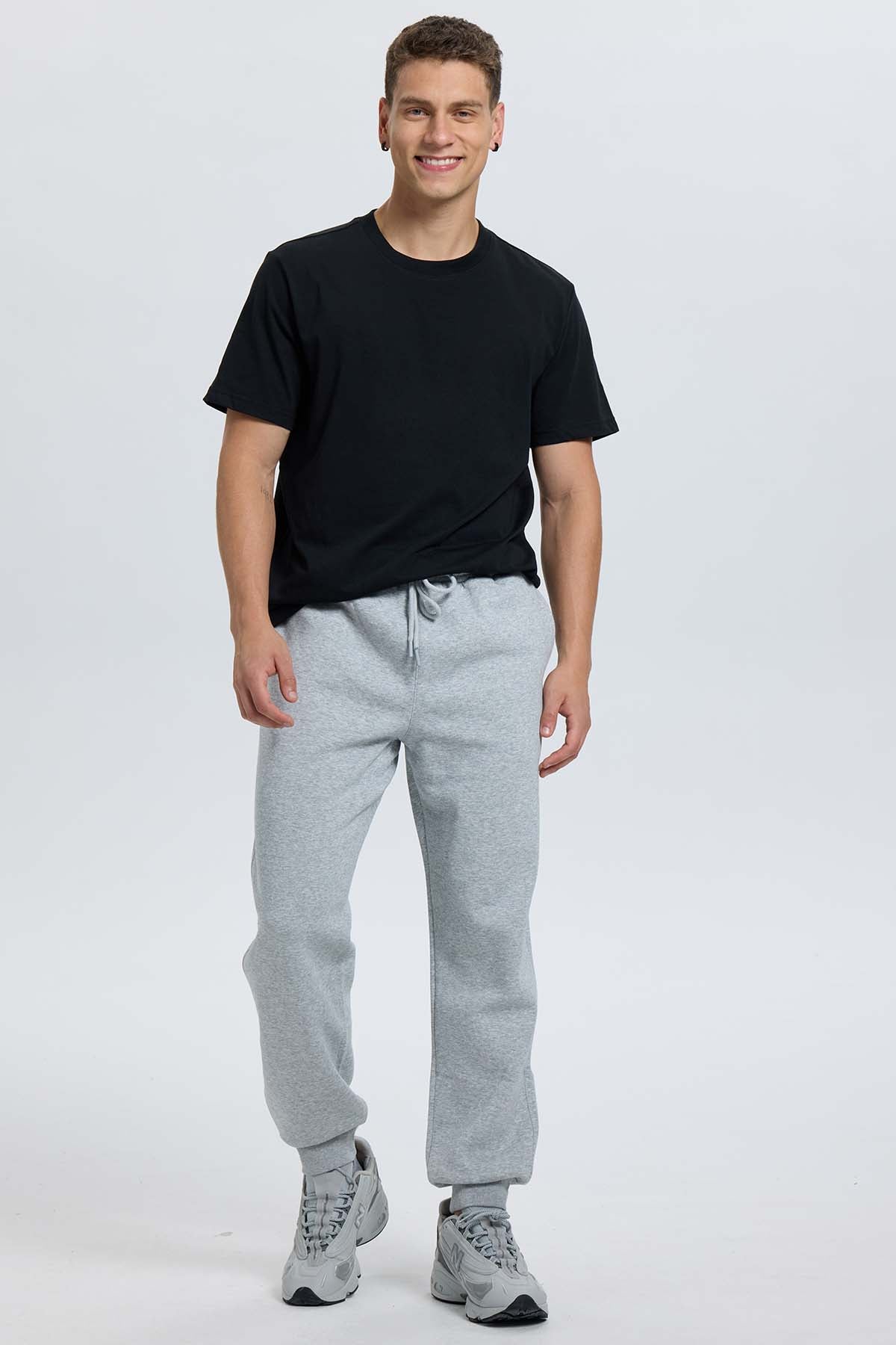 Pantalón buzo hombre jogger gris melange
