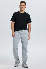 Pantalón buzo hombre jogger gris melange