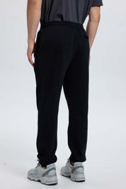 Pantalón buzo hombre jogger negro