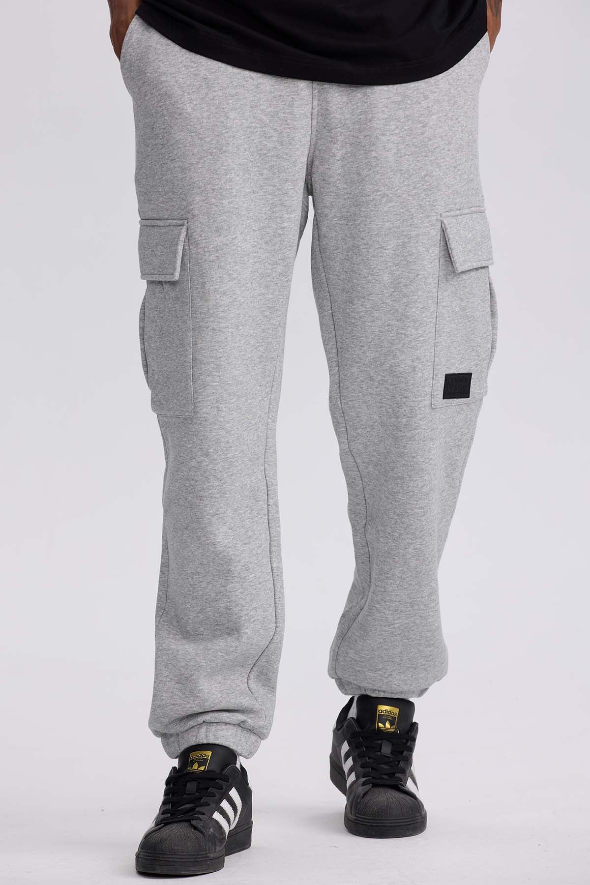Pantalón buzo hombre cargo gris melange