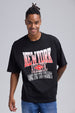 Polera negra de hombre con estampado New York Athletic en letras rojas y blancas
