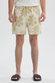Short de baño hombre tropical beige con estampado floral en tonos claros y cintura ajustable