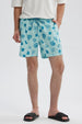 Short de baño azul celeste con estampado de palmeras y soles