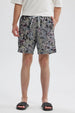 Short de baño hombre blanco y negro con estampado de hojas tropicales