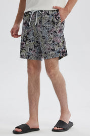 Short de baño hombre blanco y negro con estampado de hojas tropicales