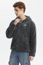 Polar hombre color marengo con capucha cremallera frontal y bolsillos laterales estilo casual sin estampa