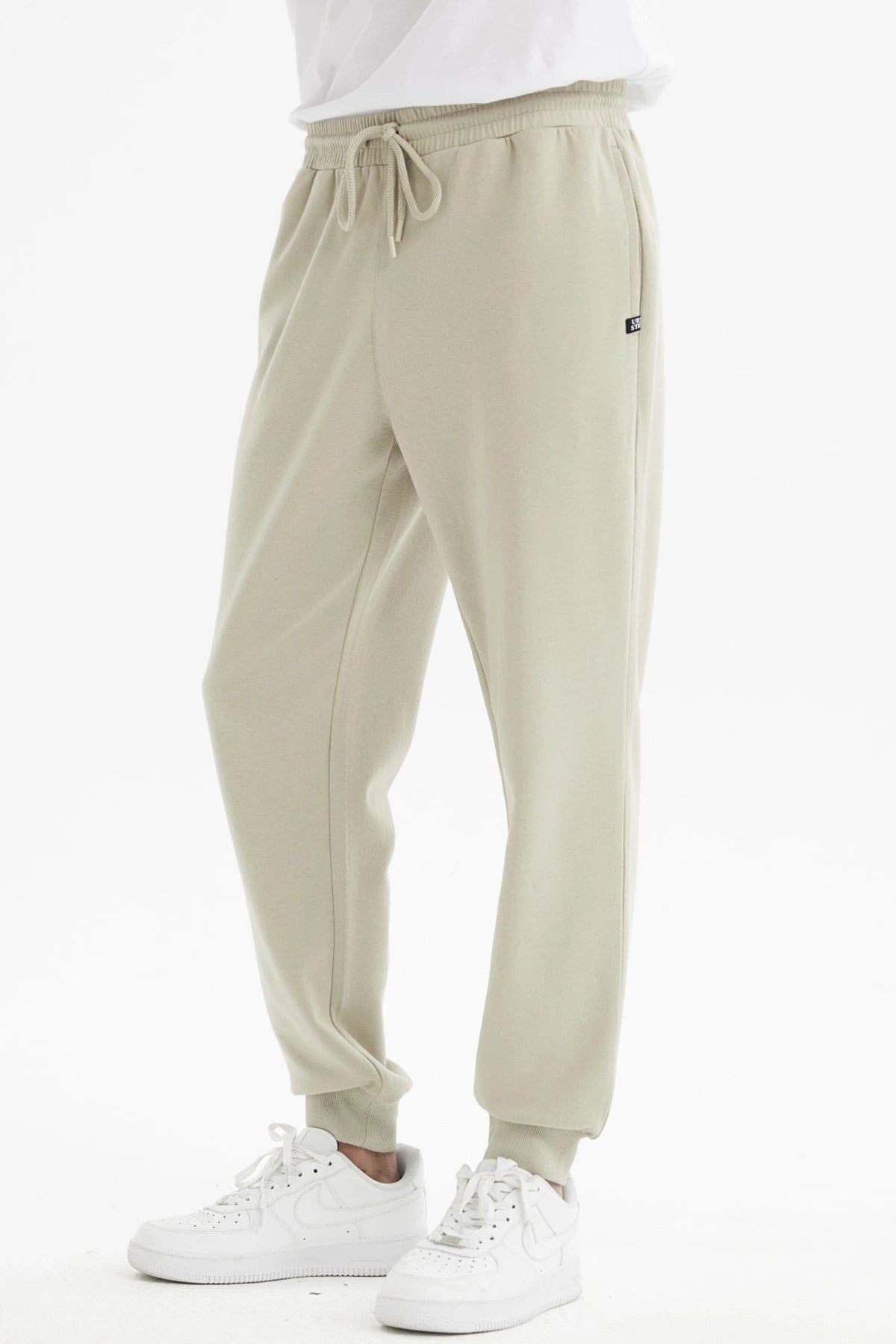 Pantalón Buzo Hombre Jogger Básico Beige Oscuro