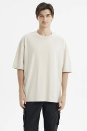 Polera oversize beige para hombre de algodón lisa sin estampado