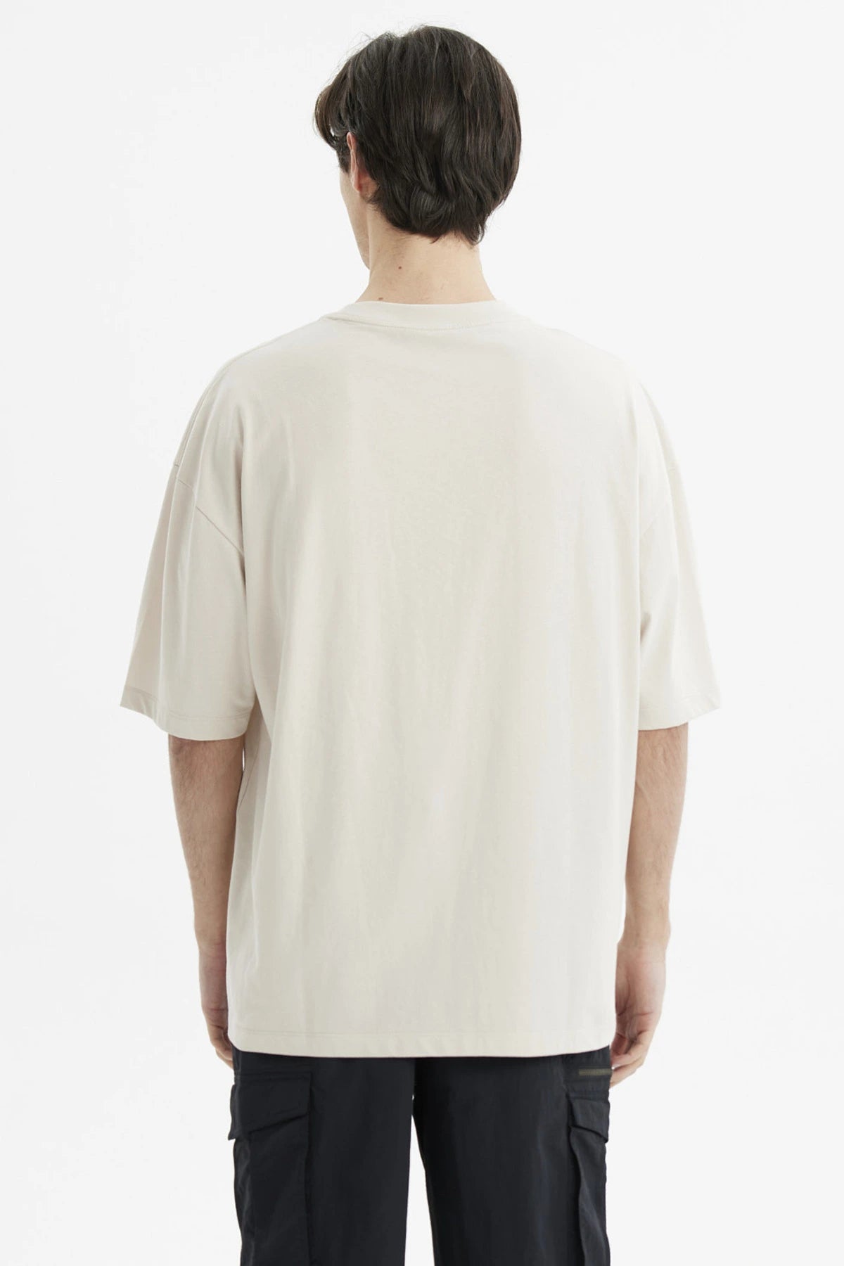 Polera oversize beige para hombre de algodón lisa sin estampado