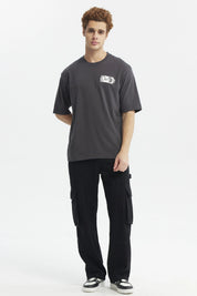 Polera oversize marengo para hombre con texto Rules en el pecho estilo casual urbano ideal para cualquier ocasi_x001F_n