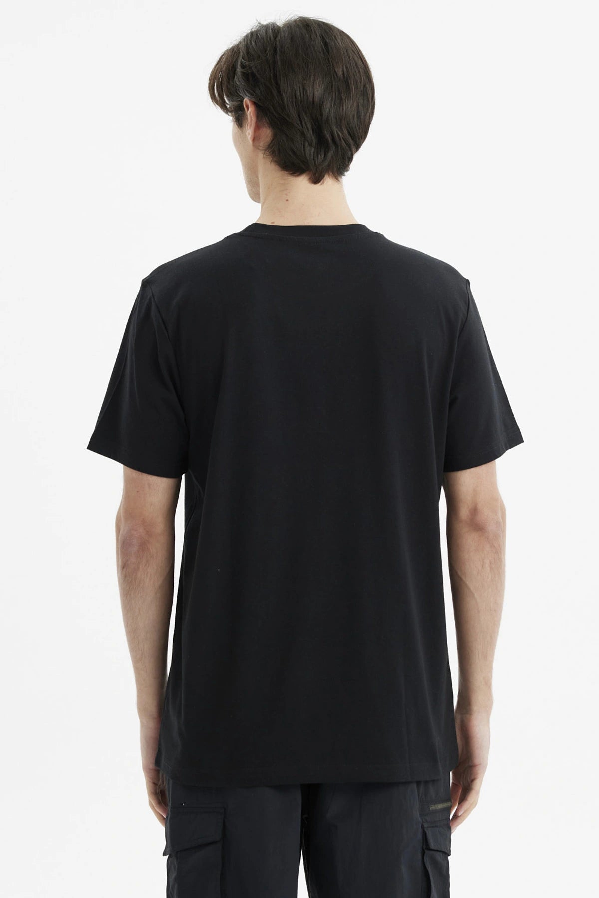 Polera negra de hombre con estampa frontal de texto New York City Global Cycling estilo casual urbano