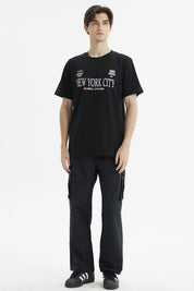 Polera negra de hombre con estampa frontal de texto New York City Global Cycling estilo casual urbano