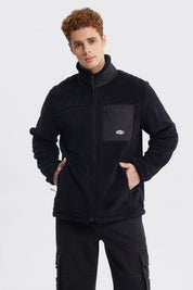 Polar negro juvenil slim para hombre con bolsillo en el pecho prenda lisa y cálida ideal para días fríos