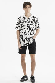 Camisa beige para hombre con estampado geométrico negro estilo graffiti en toda la prenda
