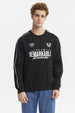 Polerón oversize negro con texto Team Remarkable Leadership en el pecho diseño deportivo y líneas blancas en las mangas