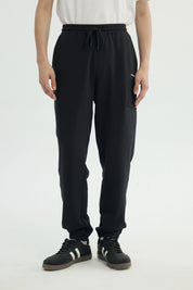 Pantalón Buzo Hombre Pitillo Negro