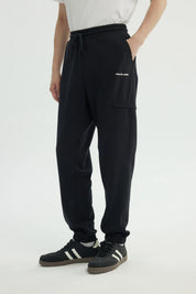 Pantalón Buzo Hombre Pitillo Negro