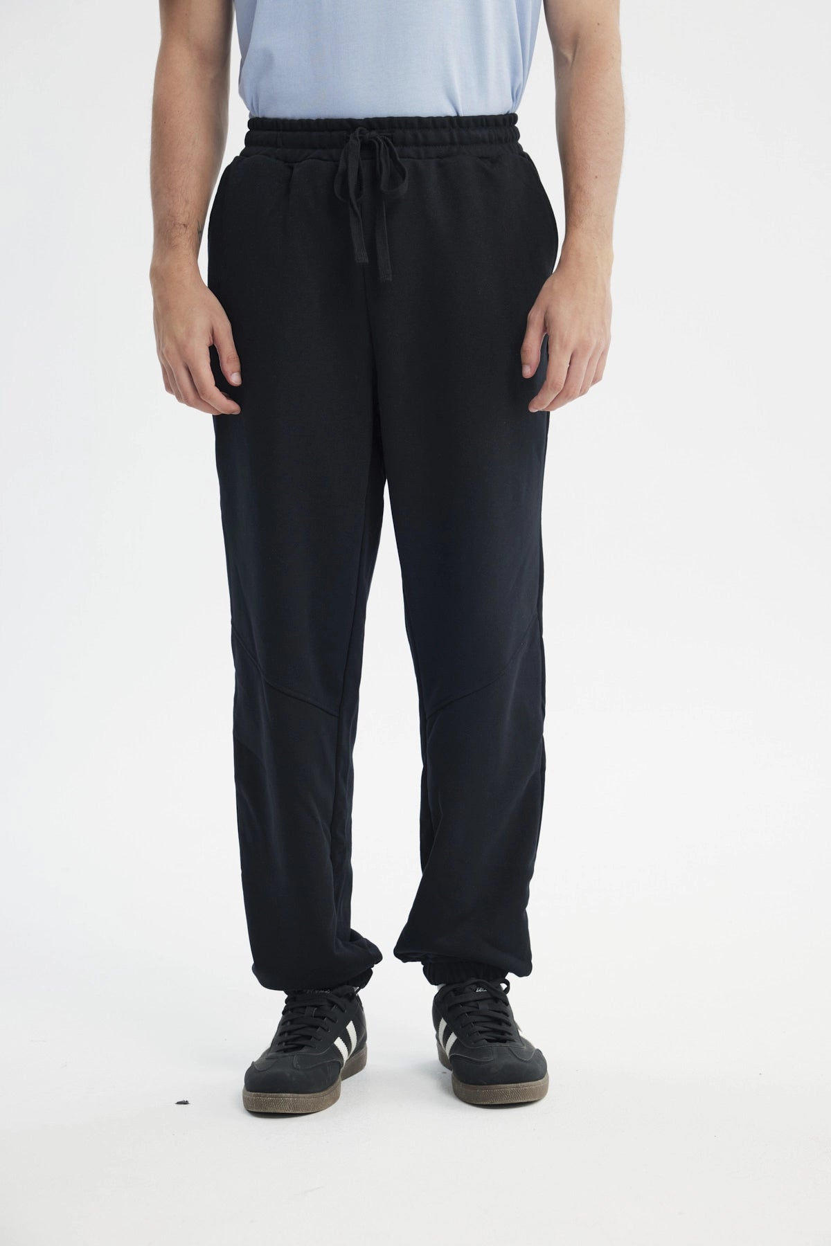 Pantalón Buzo Hombre Pitillo Negro