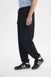 Pantalón Buzo Hombre Pitillo Negro