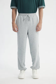 Pantalón Buzo Hombre Pitillo Gris Melange