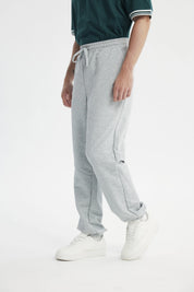 Pantalón Buzo Hombre Pitillo Gris Melange
