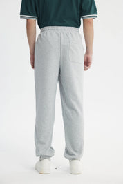 Pantalón Buzo Hombre Pitillo Gris Melange