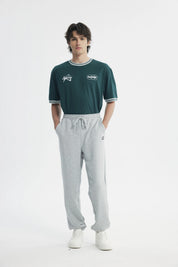 Pantalón Buzo Hombre Pitillo Gris Melange